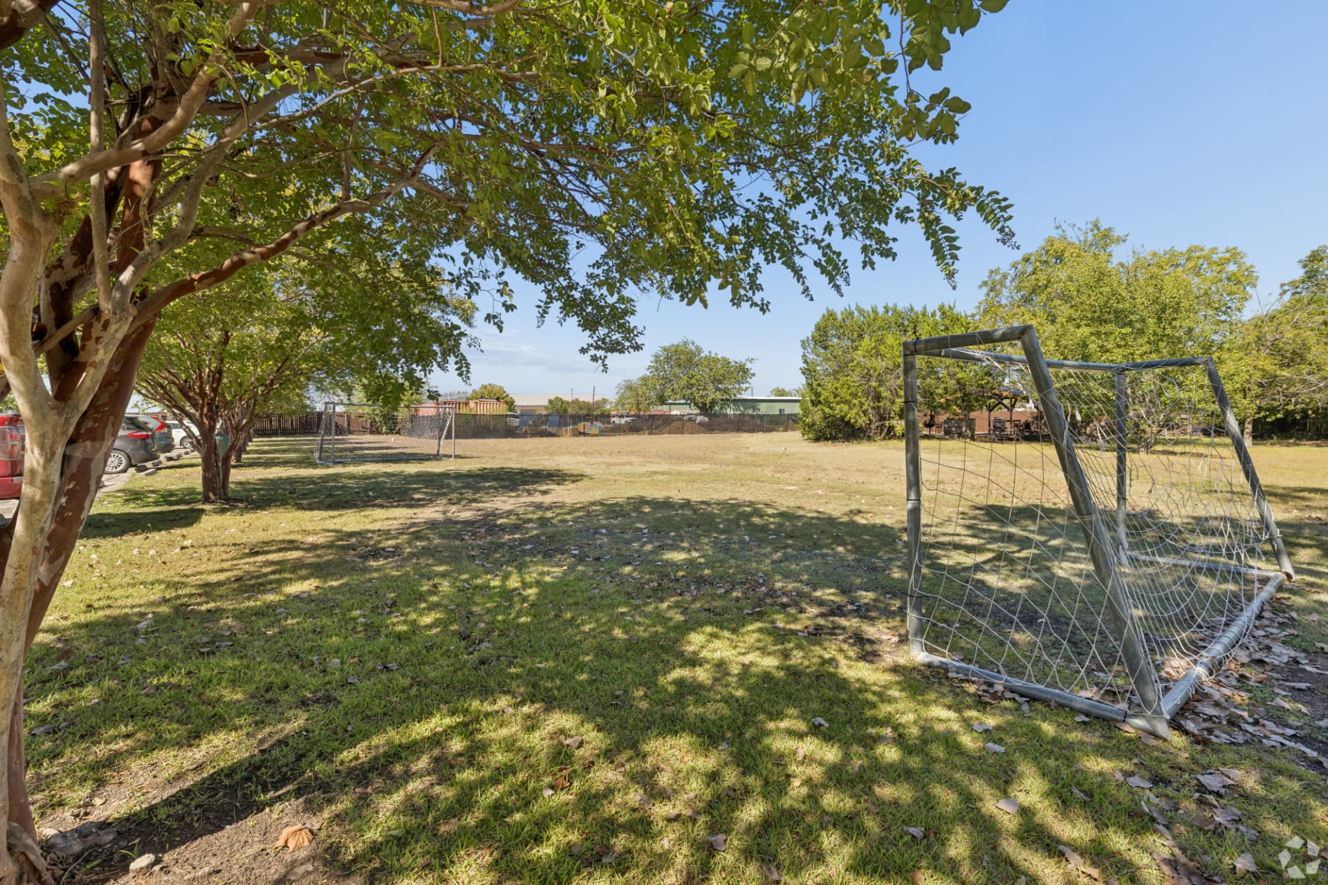 Open community soccer field with goals