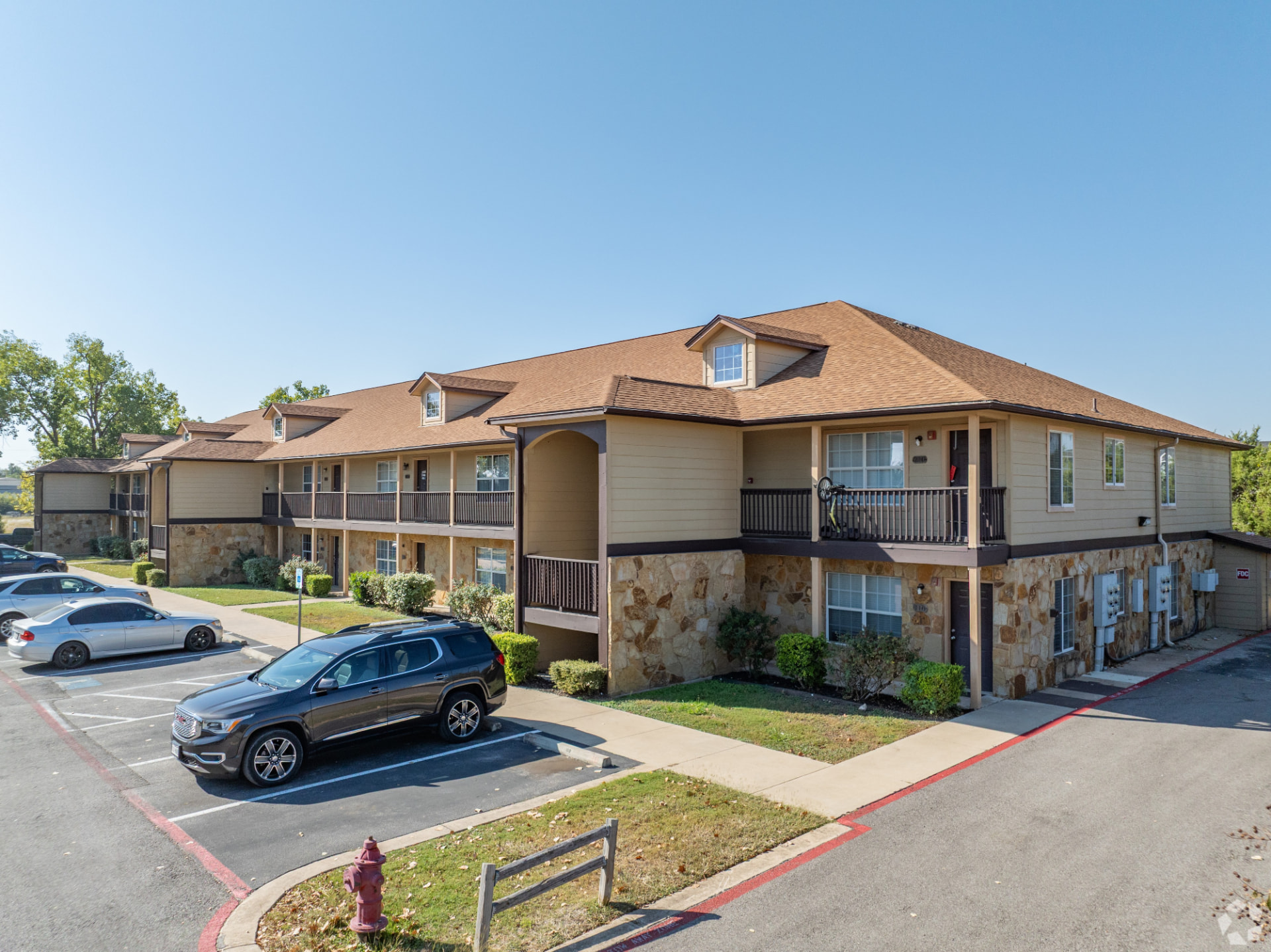 Montierra Ranch building with parking and landscaping