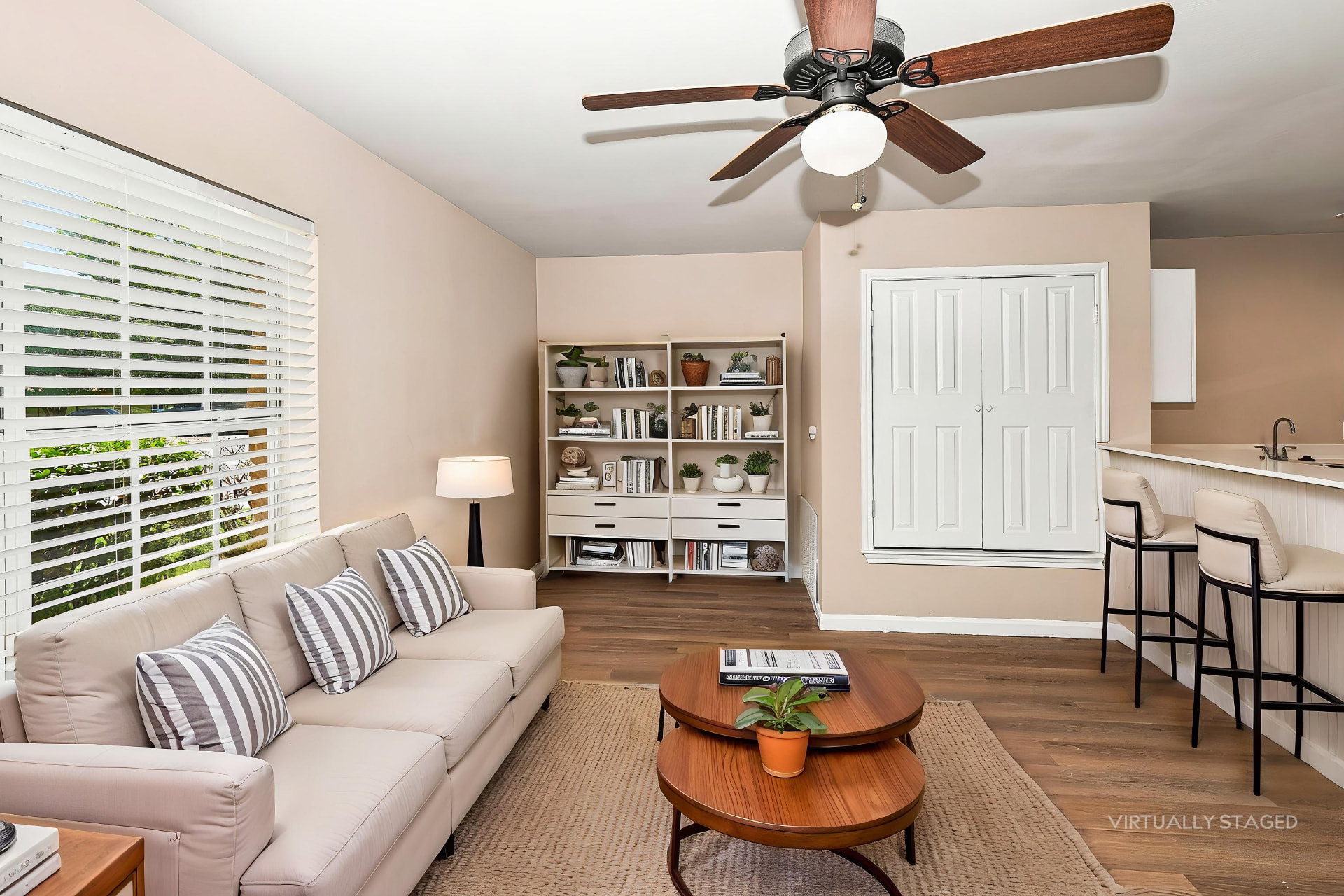 Renovated living room shown with furniture placement (virtually staged)